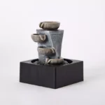 Amber Modern Twisted Fountain with 1 Yellow Light - 18x18x25 cm
