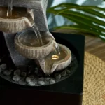 Amber Modern Twisted Fountain with 1 Yellow Light - 18x18x25 cm