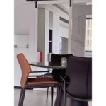 Luxury - Inspired Grey Leather Dining Chair with Armrests & Iconic Emblem(1 piece)