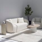 Melina Oval Travertine Coffee Table With White Base