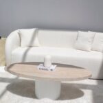 Melina Oval Travertine Coffee Table With White Base