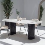 Dakota Greek Calacatta Marble Oval Dining Table With Black Marquina Half Moon Legs