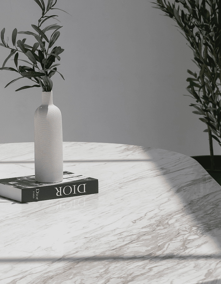 Dakota Greek Calacatta Marble Oval Dining Table With Black Marquina Half Moon Legs - Image 2