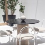 Cynthia Black Marquina Marble Dining Table with Travertine Base