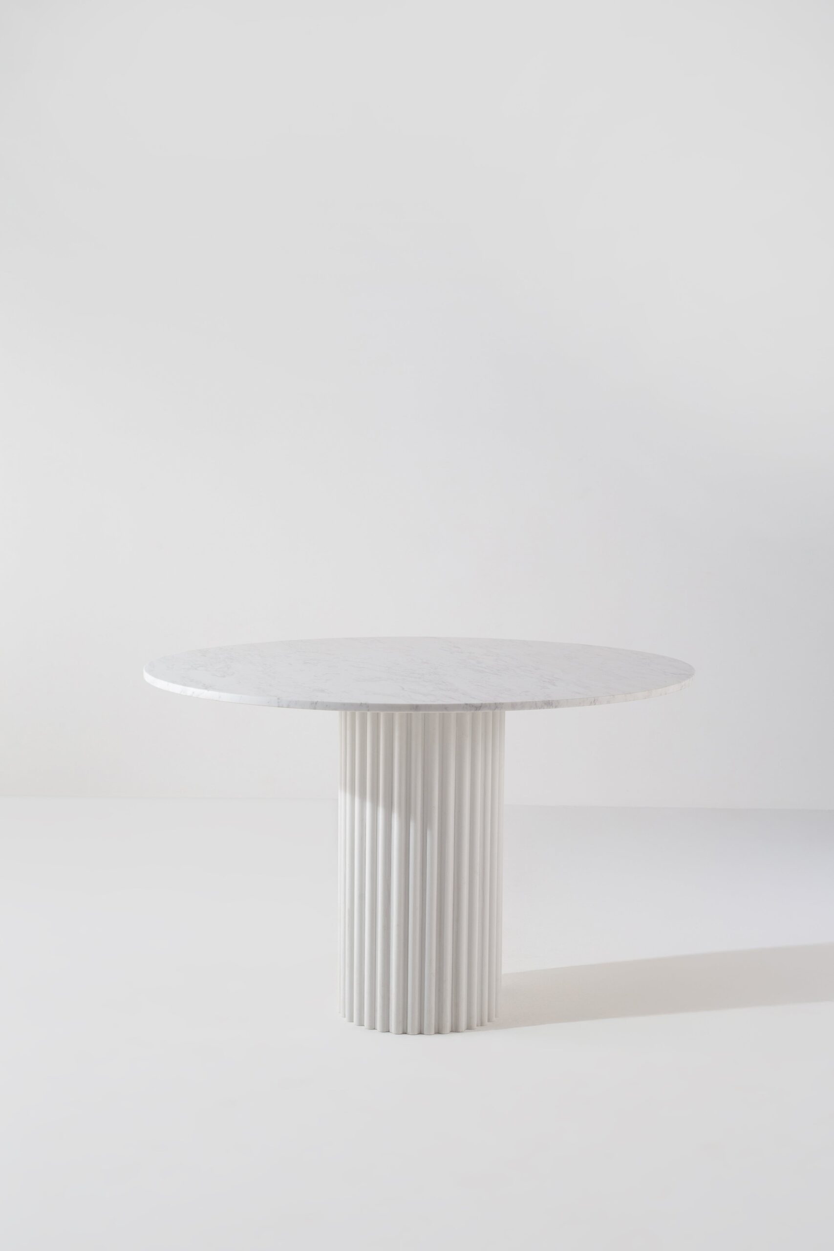 Claire Bianco Venus Dining Table with White Quartz Base