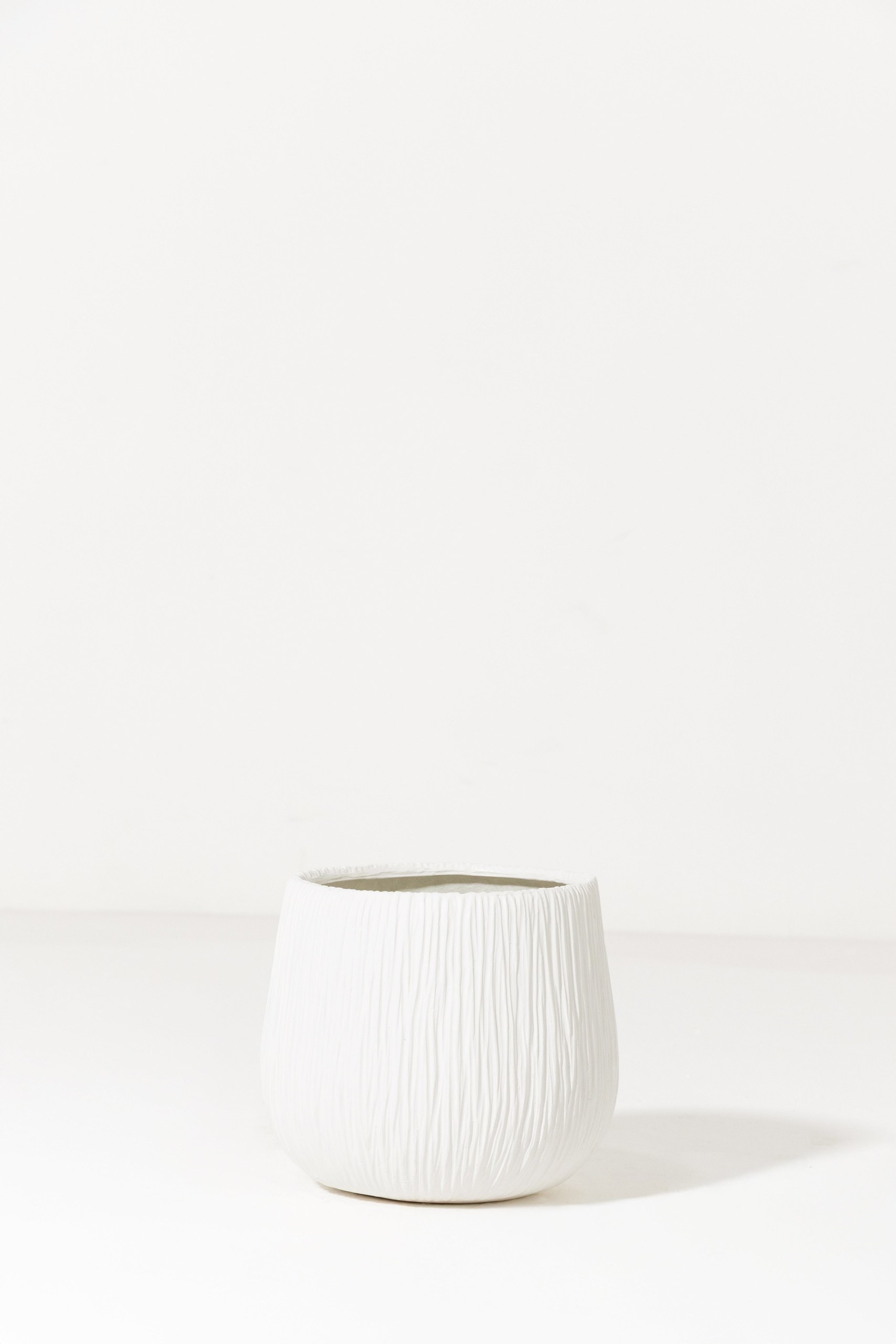 Oryn Off White Textured Fiberglass Pot