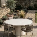 Abigail Off White Speckled Microconcrete Irregular Outdoor Dining Table